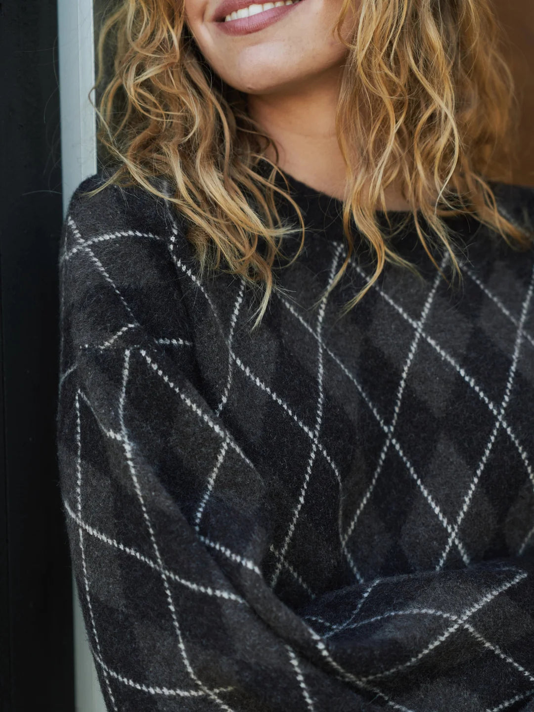 Kick check knit blouse