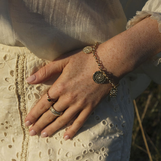 Solstice gold charms